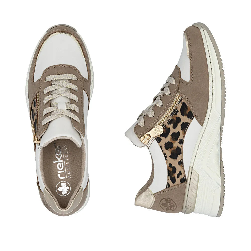 Rieker N4308-64 ladies wide white, taupe, and leopard print zip and lace trainers with a chunky white sole.