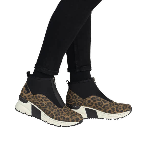 Rieker N6352-90 women's multi-front zip ankle boots with leopard print accents and sporty white sole.