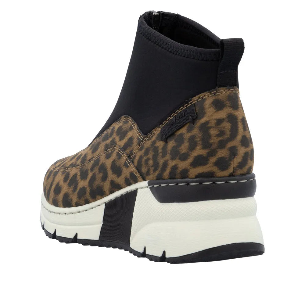 Rieker N6352-90 women's ankle boots with leopard print suede, black stretchy upper, front zip, chunky white and black sole.