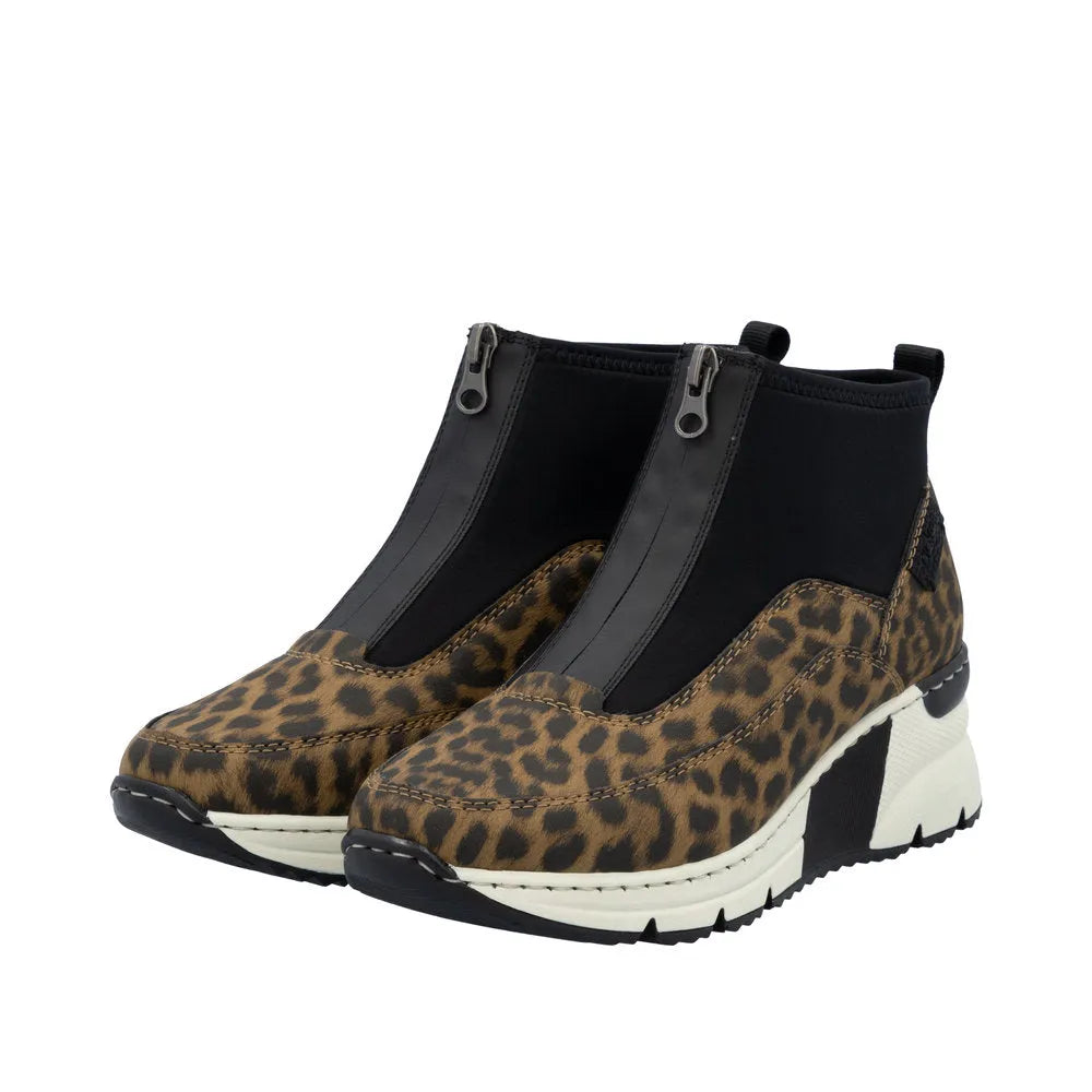 Rieker N6352-90 women's ankle boots with leopard print, front zip, black stretchy fabric, and chunky white and black sole.
