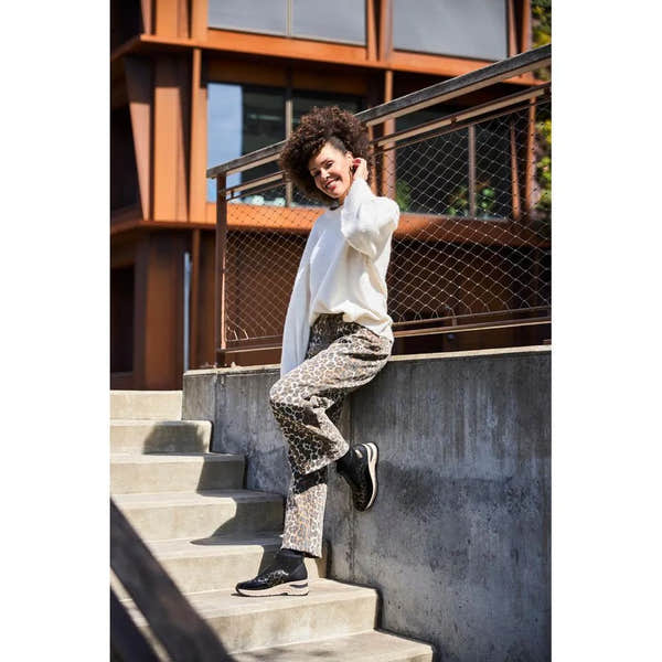 Rieker N9362-00 women's black and textile front zip ankle boots, stylish footwear with leopard print accents, suitable for casual wear.