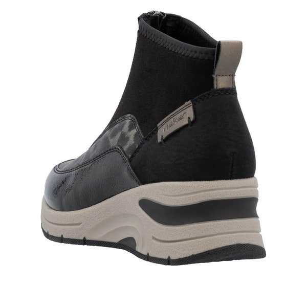 Rieker N9362-00 women's black ankle boots with textile front zip and chunky sole design.