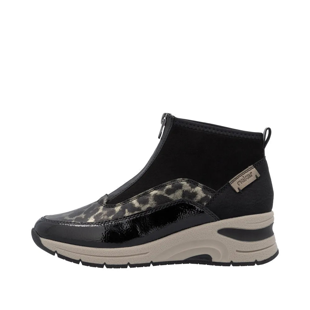 Rieker N9362-00 women's black textile and faux leather ankle boots with front zipper, leopard print detail, and chunky sole.