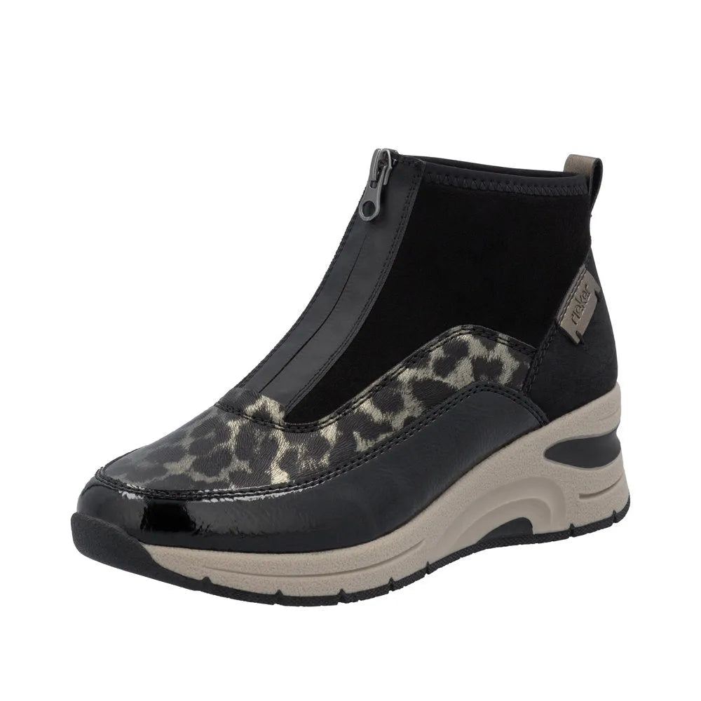 Rieker N9362-00 women's black ankle boots with textile front zip, leopard pattern, and chunky sole.