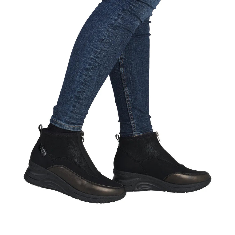 Rieker N9362-01 women's black textile ankle boots with front zip, comfortable slip-on design, and rugged sole.