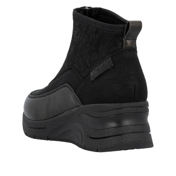 Rieker N9362-01 womens black ankle boots with textile front zip, chunky sole and combed design.