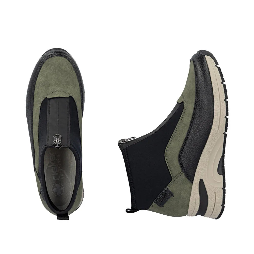 Rieker N9362-54 women's green ankle boots with front zip, slip-on design, cushioned sole, and mixed leather and fabric upper.