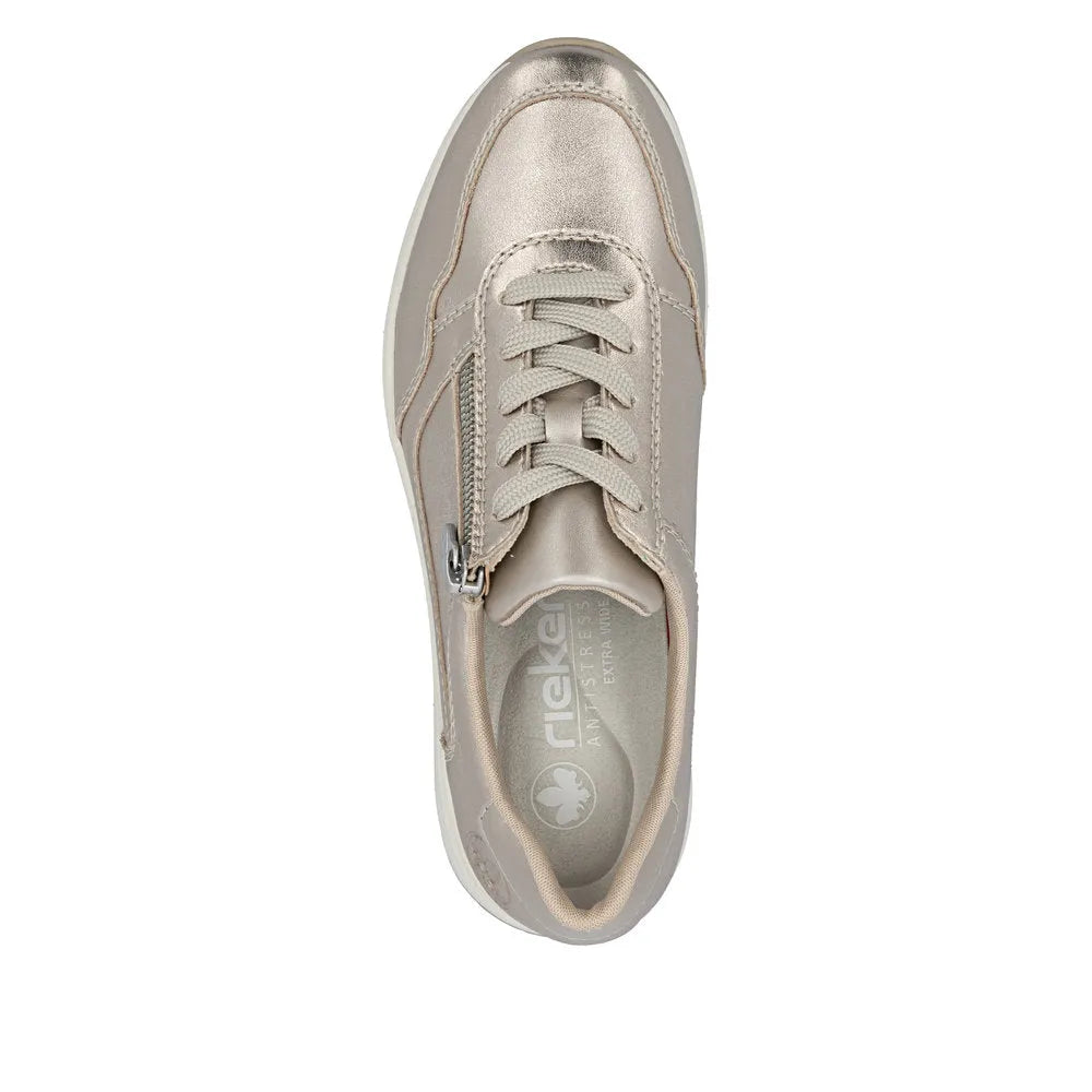 Ladies champagne leather wide-fit sneaker with lace-up, side zipper, and cushioned interior.