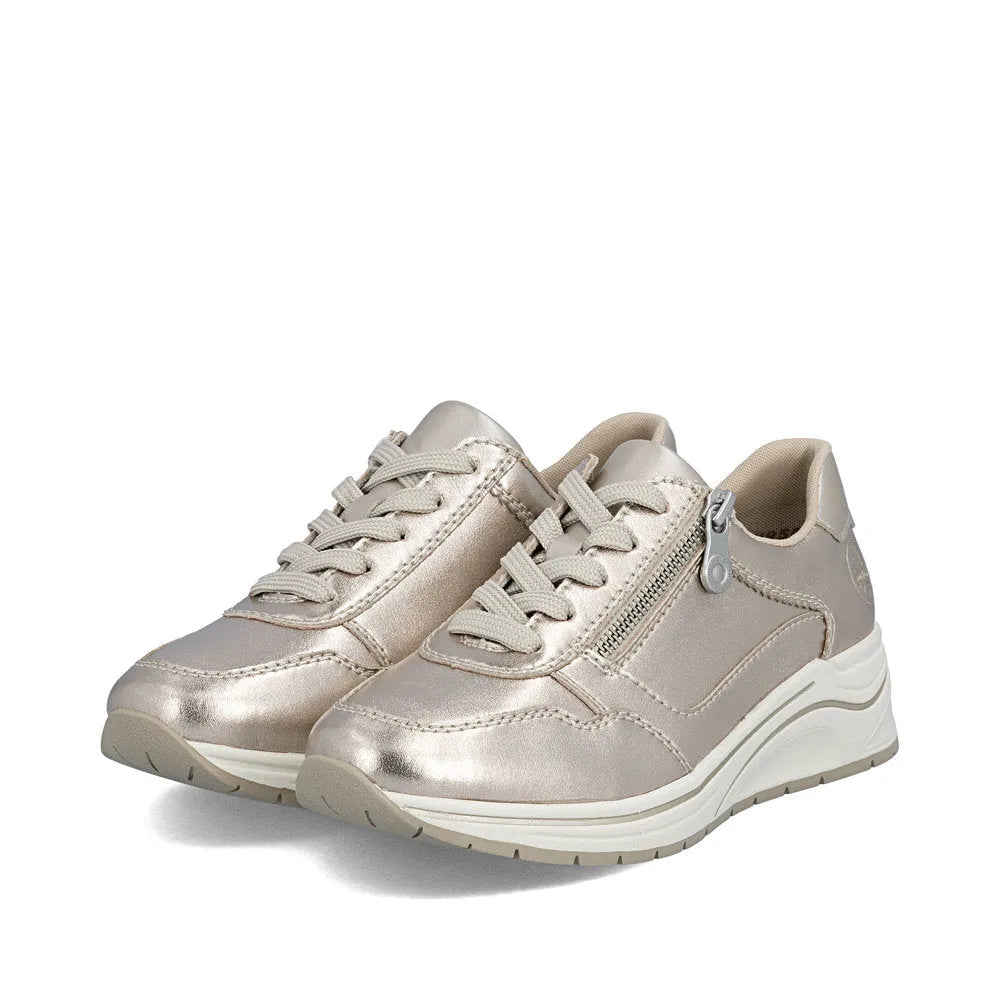Gold metallic leather women's sneakers with lace-up front, side zipper, and white chunky sole.