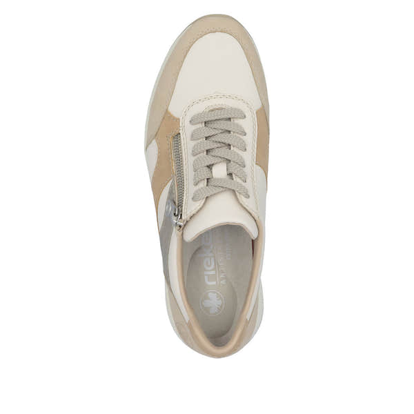 Rieker N9518-60 ladies wide-fit zip and lace trainers in beige and white with multi-zip design and cushioned sole.