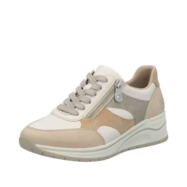 Rieker N9518-60 women's wide fit trainers with multi-zip, lace-up closure, beige and white color, cushioned sole, and textured details.