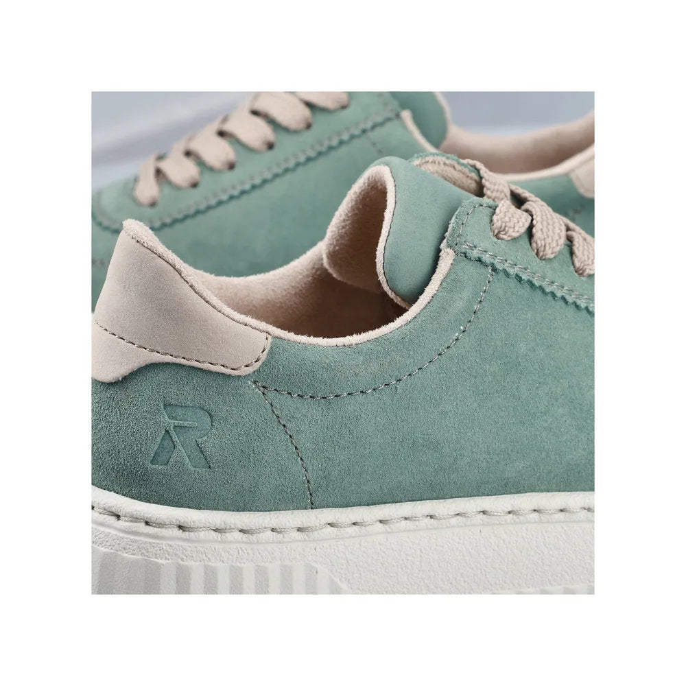 Mint suede lace-up trainers with cream accents, soft interior, and stylish stitching details.