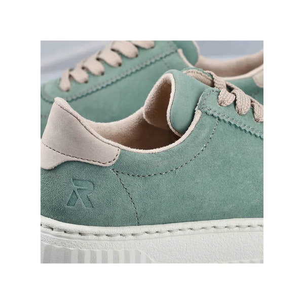 Mint suede lace-up trainers with cream accents, soft interior, and stylish stitching details.