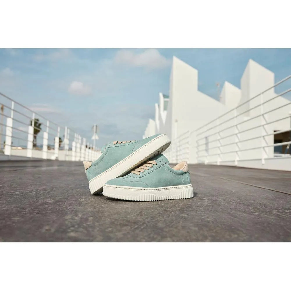 Mint suede lace-up trainers with white rubber soles, beige accents, and a casual, sporty style.