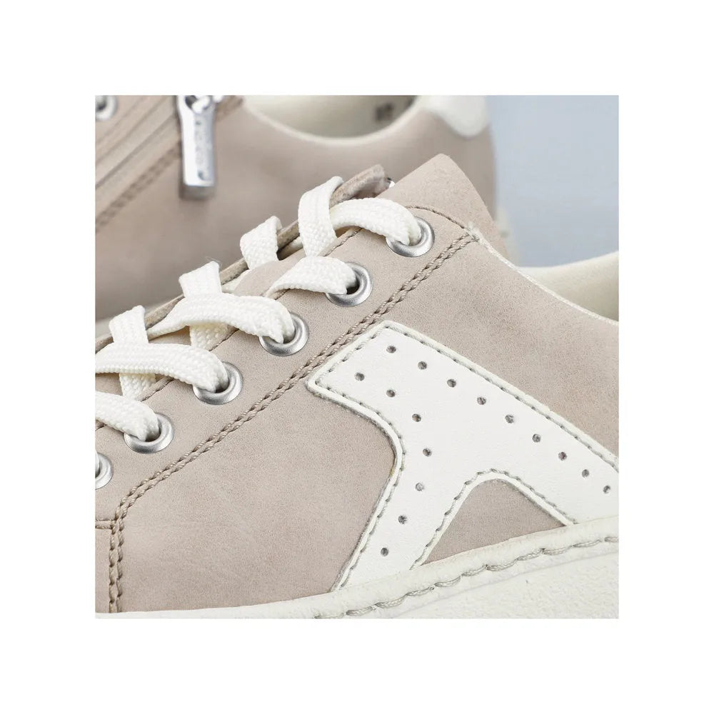 Rieker N9920-62 ladies' ginger and off-white sport trainers with lace and zip, featuring synthetic materials and perforated details.