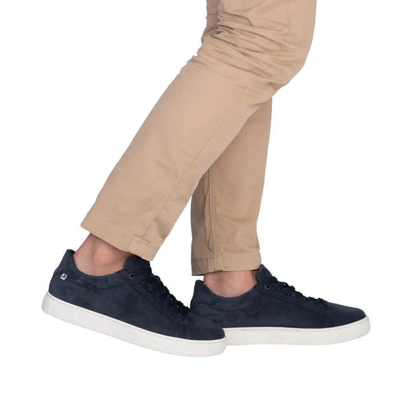 Men's blue suede lace-up shoes with white rubber soles, casual style, visible stitched detailing.