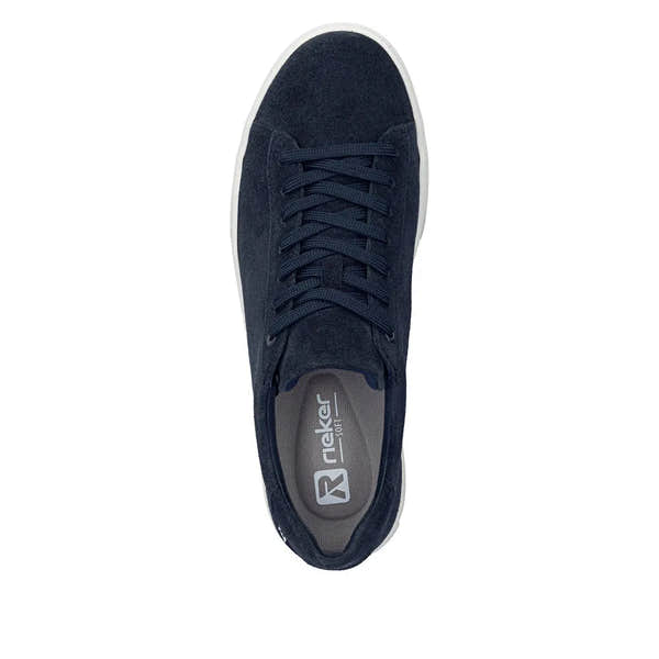 Blue suede lace-up men's shoes with white sole, from top view, branded "Rieker" inside.