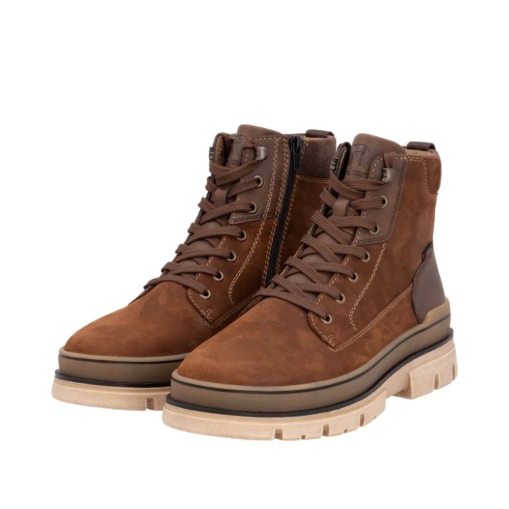 Rieker U1273-22 men's brown suede ankle boots with zip and lace-up design, cushioned sole, and rugged outsole.