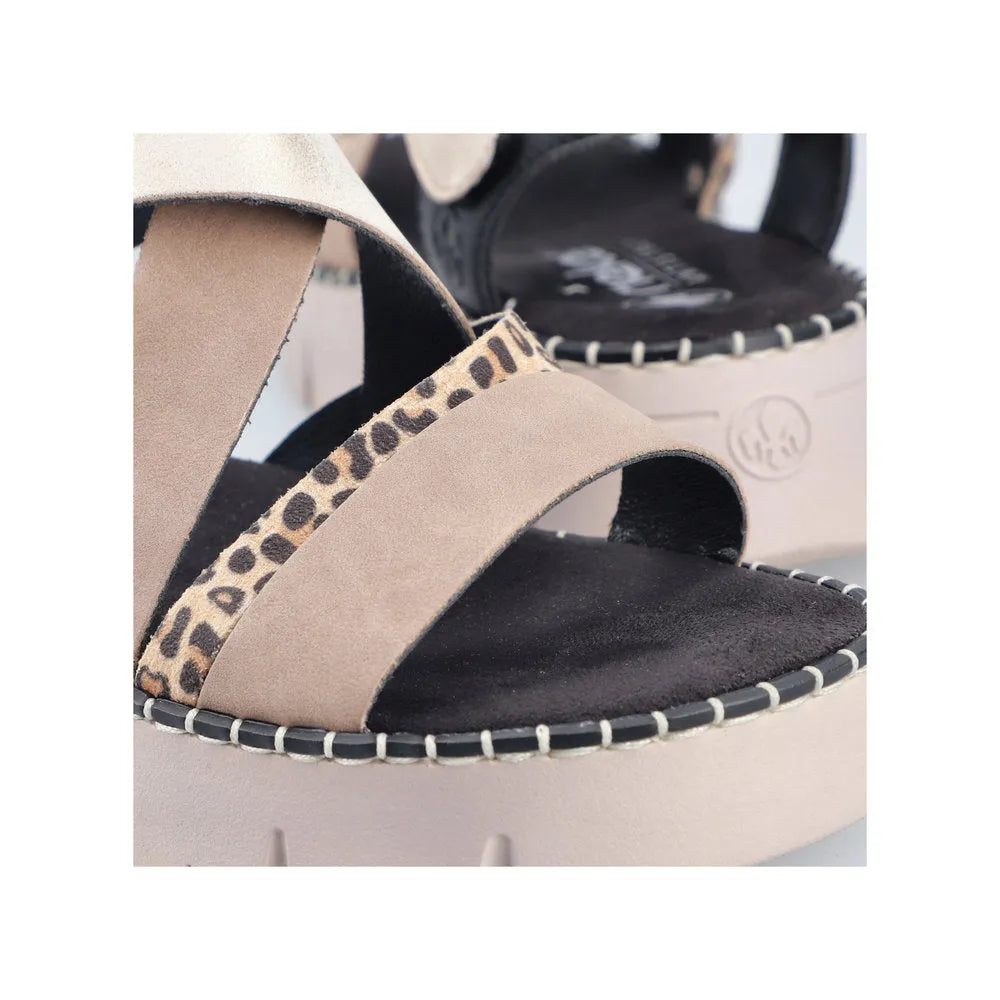 Rieker V1063-90 women's multi-touch fastening sandals with beige straps, leopard-print detailing, and cushioned sole.