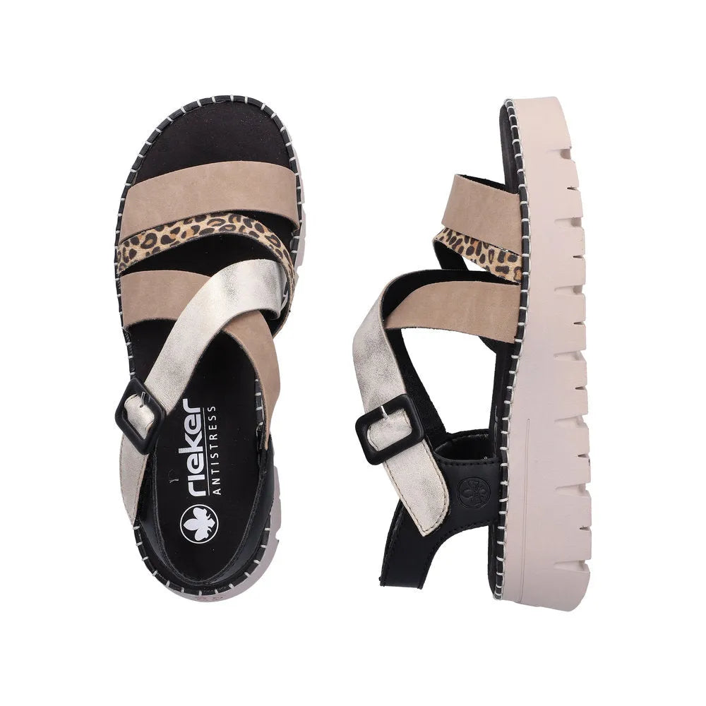 Rieker V1063-90 women's multi-touch fastening sandals with beige, leopard, and metallic straps, chunky sole, and slip-on design.