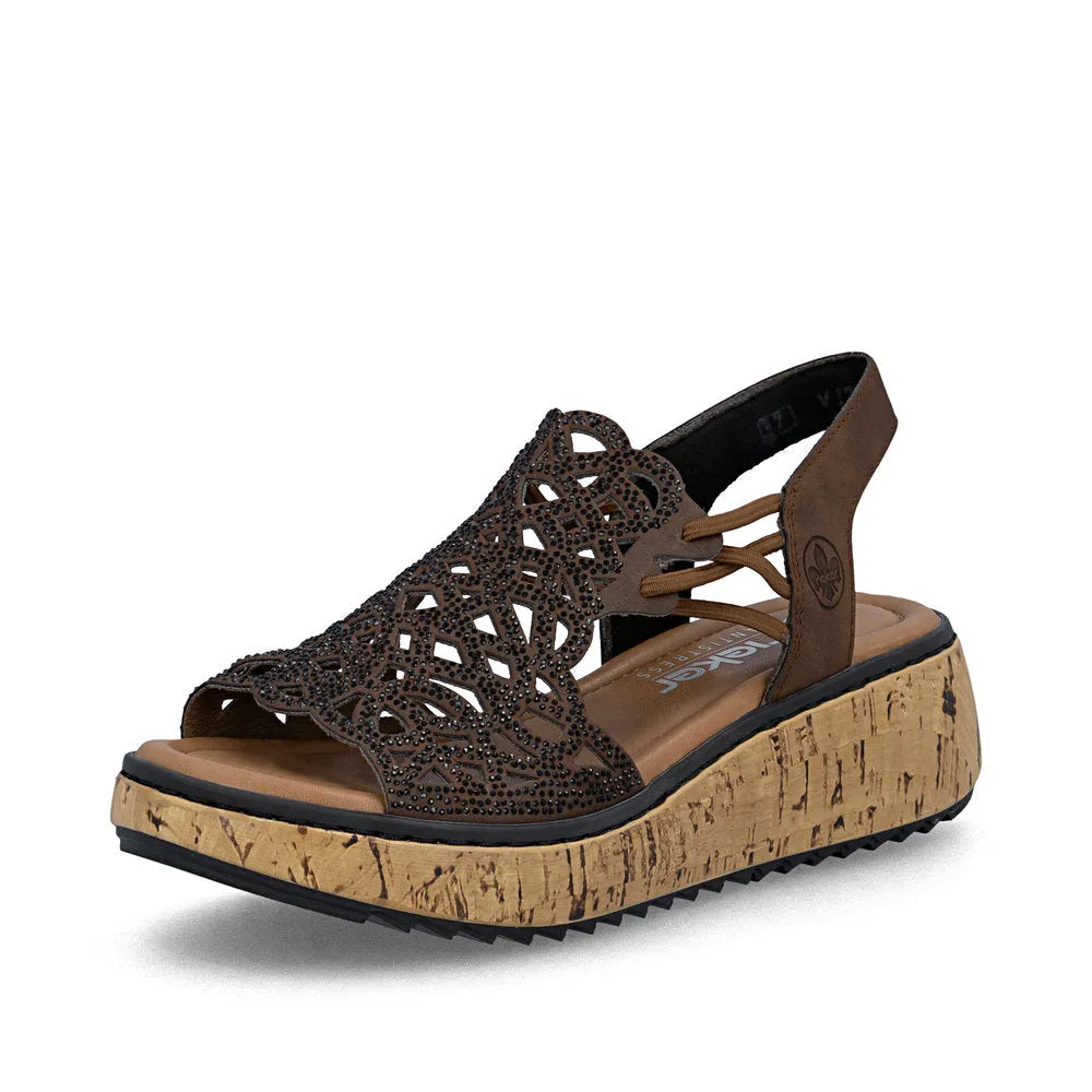 Rieker V1765-24 women's wide brown elasticated sandal with cutout design and cork platform sole.