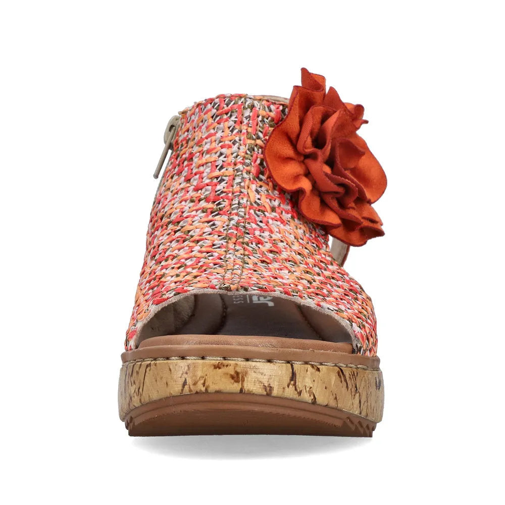 Rieker V1783-90 women's pumpkin orange textile sandals with side zip and decorative ruffle detail.