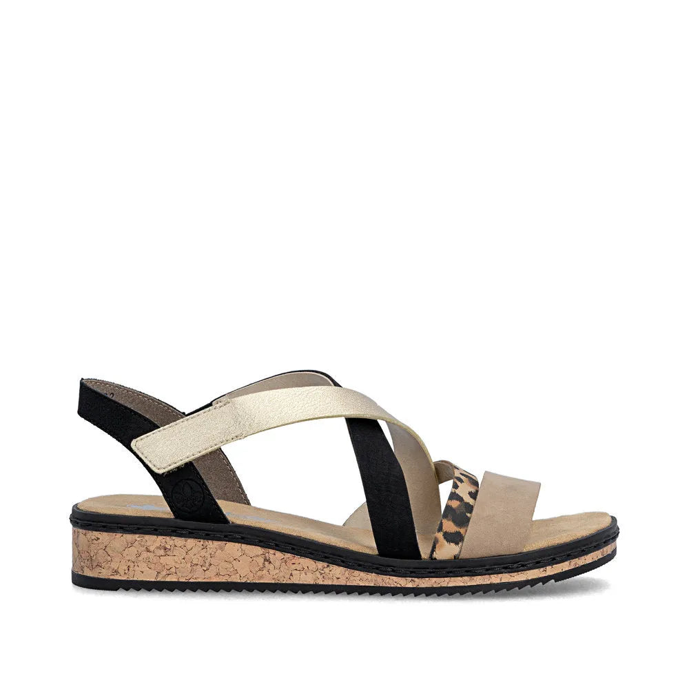 Rieker V3663-92 women’s multi-strap touch-fastening sandals with leopard print details, beige, black, and cork wedge sole.