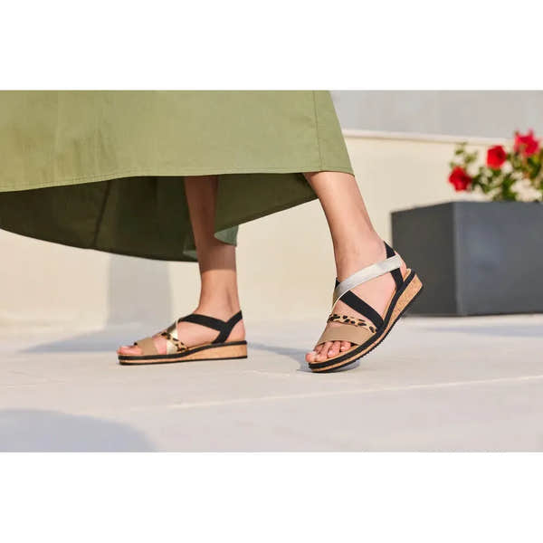 Rieker V3663-92 women's multi-touch fastening sandals with mixed beige, leopard print, black, and silver straps, cork soles.