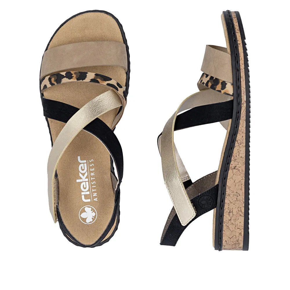 Rieker V3663-92 women's multi-strap touch-fastening sandals with beige, leopard print, black, and metallic straps, cushioned footbed, and cork-style sole.
