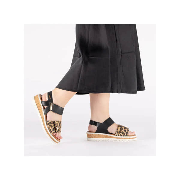 Rieker V4181-00 women's wide multi-touch fastening sandals with leopard print straps and cork platform sole.