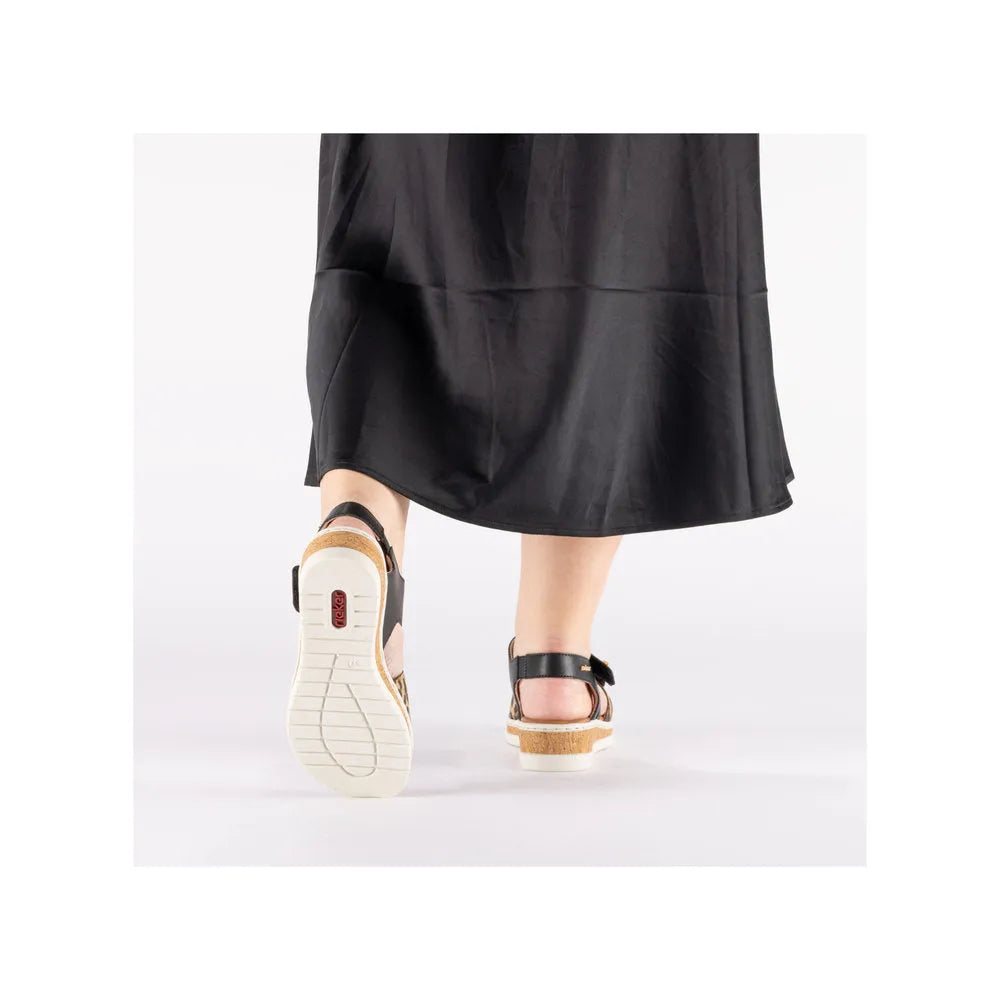 Rieker V4181-00 women's wide fit multi-touch fastening sandals with black straps and beige soles.