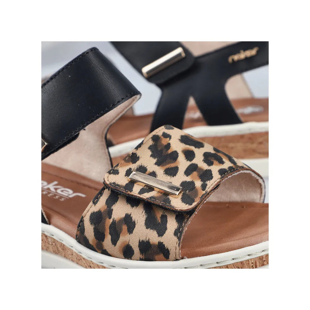 Rieker V4181-00 Ladies wide-fit multi-touch fastening sandals with leopard print strap and black ankle strap, cushioned footbed.