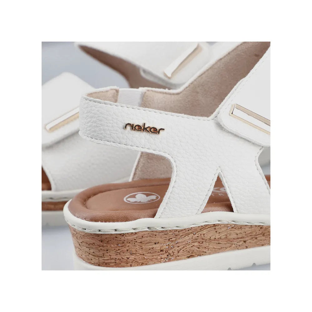 Rieker V4181-80 women's wide white touch fastening sandals with cushioned insole and cork wedge heel.