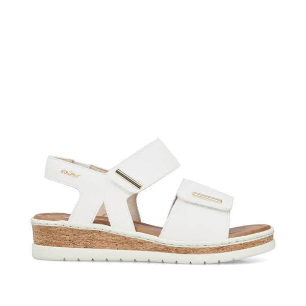 Rieker V4181-80 women's wide-fit white touch fastening sandals with cork wedge sole and adjustable straps.