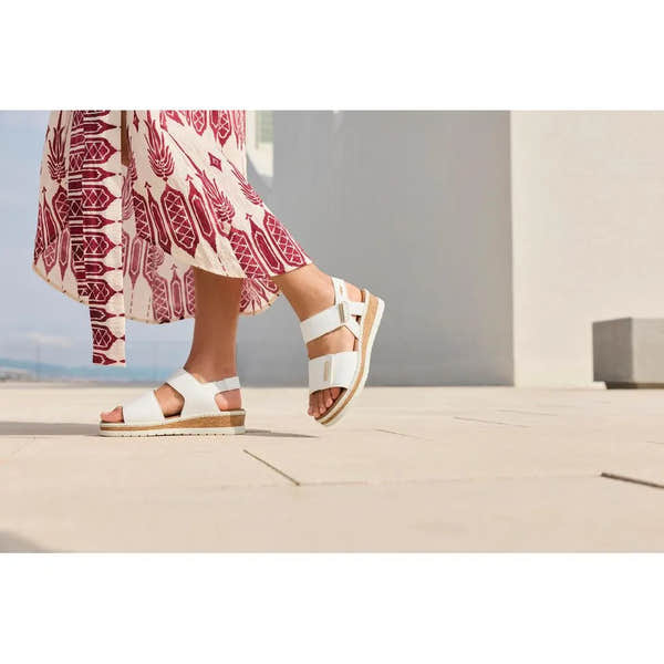 Rieker V4181-80 women's white wide-fit touch fastening sandals, open-toe with adjustable straps and wedge sole.