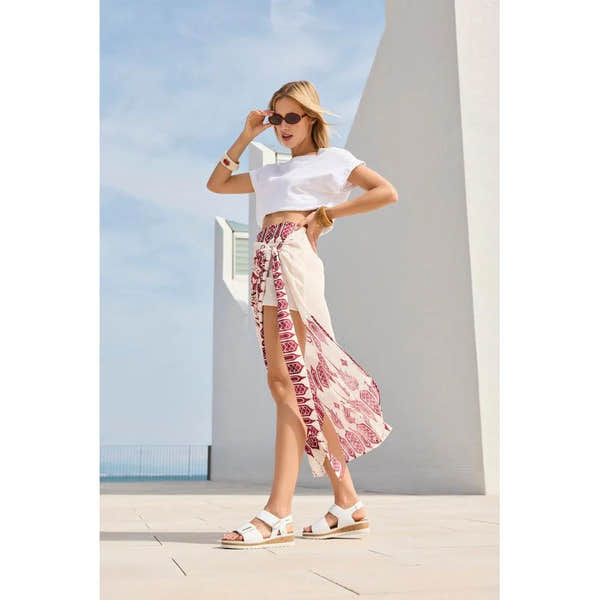 Rieker V4181-80 women's wide white touch fastening sandals with open toes and adjustable straps, styled for summer wear.