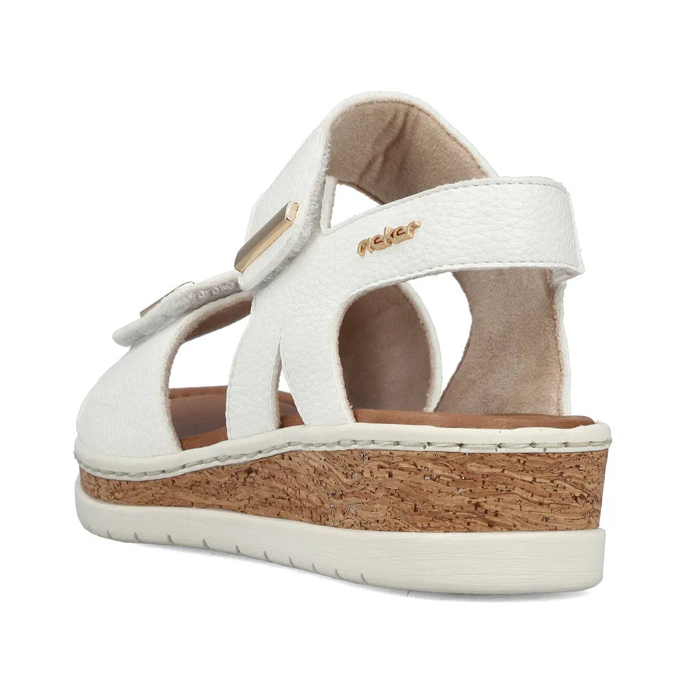 Rieker V4181-80 women's wide white touch fastening sandals with cork wedge sole and adjustable straps.