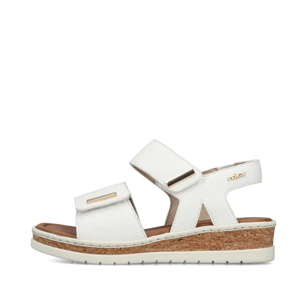 Rieker V4181-80 women's white wide-fit touch-fastening sandals with cork wedge sole and adjustable straps.