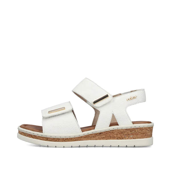 Rieker V4181-80 women's white wide-fit touch-fastening sandals with cork wedge sole and adjustable straps.