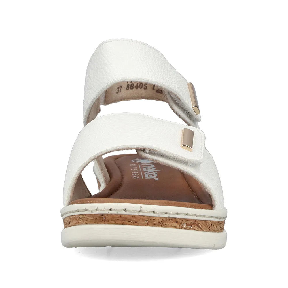 Rieker V4181-80 women's wide white touch fastening sandals with cushioned footbed and cork heel detail.