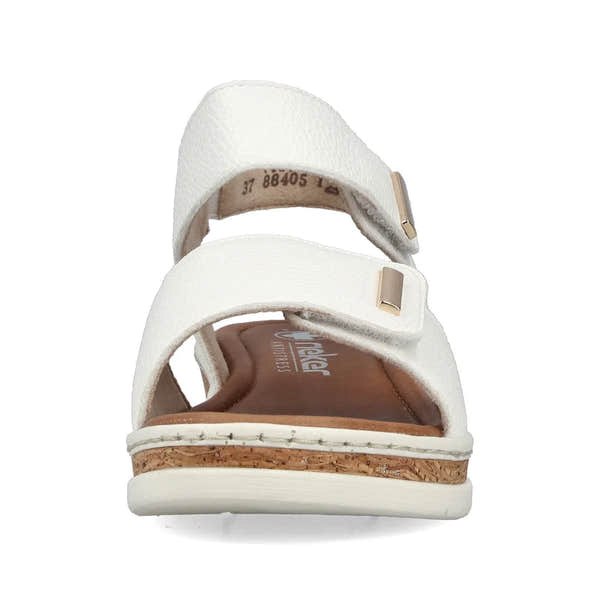 Rieker V4181-80 women's wide white touch fastening sandals with cushioned footbed and cork heel detail.