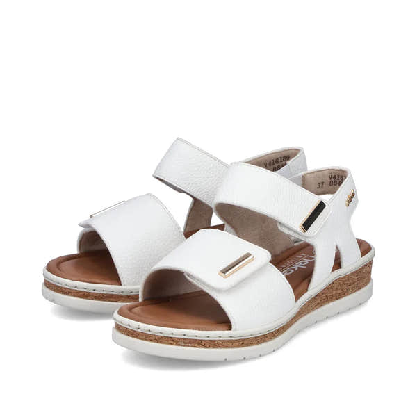 Rieker V4181-80 women's white wide-fit touch fastening sandals with chunky cork sole and adjustable straps.