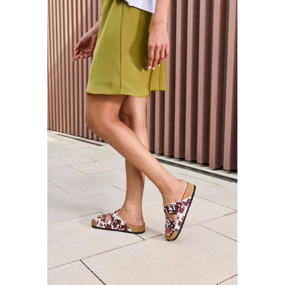 Rieker V6391-90 women's animal print buckle sandals with cork footbed and open toe, stylish and comfortable for warm weather.