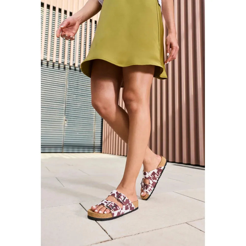 Rieker V6391-90 women's animal print buckle sandals with white and burgundy pattern and adjustable straps.