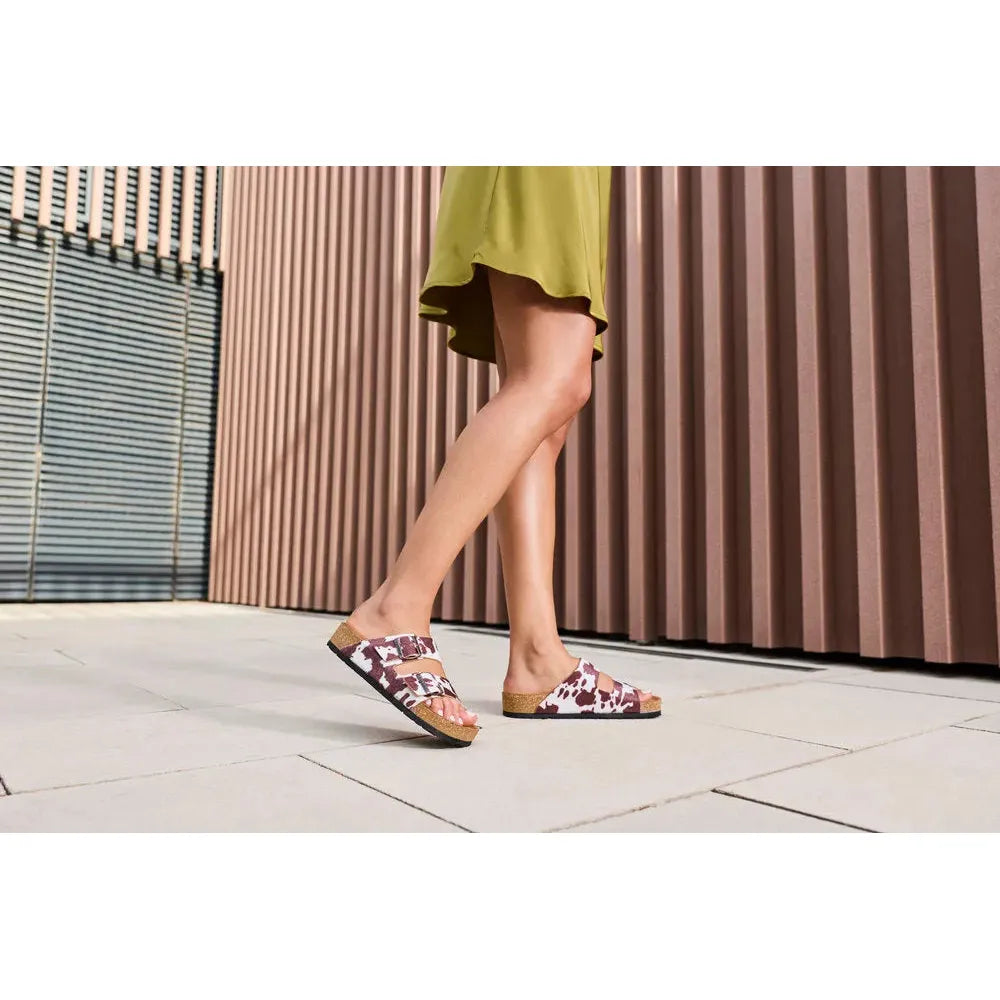 Rieker V6391-90 women’s animal print buckle sandals, slip-on style with cork soles and stylish animal pattern.