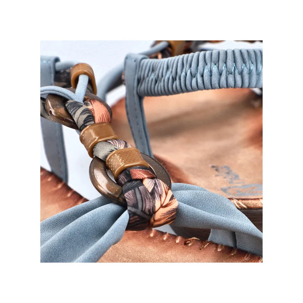 Rieker V7568-14 Ladies denim blue elasticated sandals with stylish braided strap and decorative buckle details.