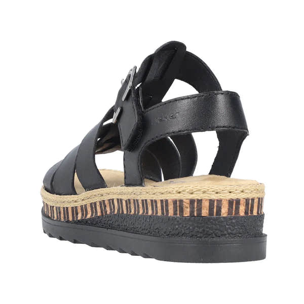 Rieker V7904-00 women's black leather wedge sandals with touch fastening straps and patterned espadrille-style sole.