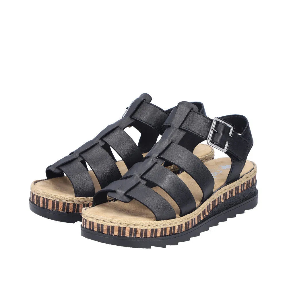 Rieker V7904-00 women's black leather touch fastening sandals with striped wedge sole and open toe design.
