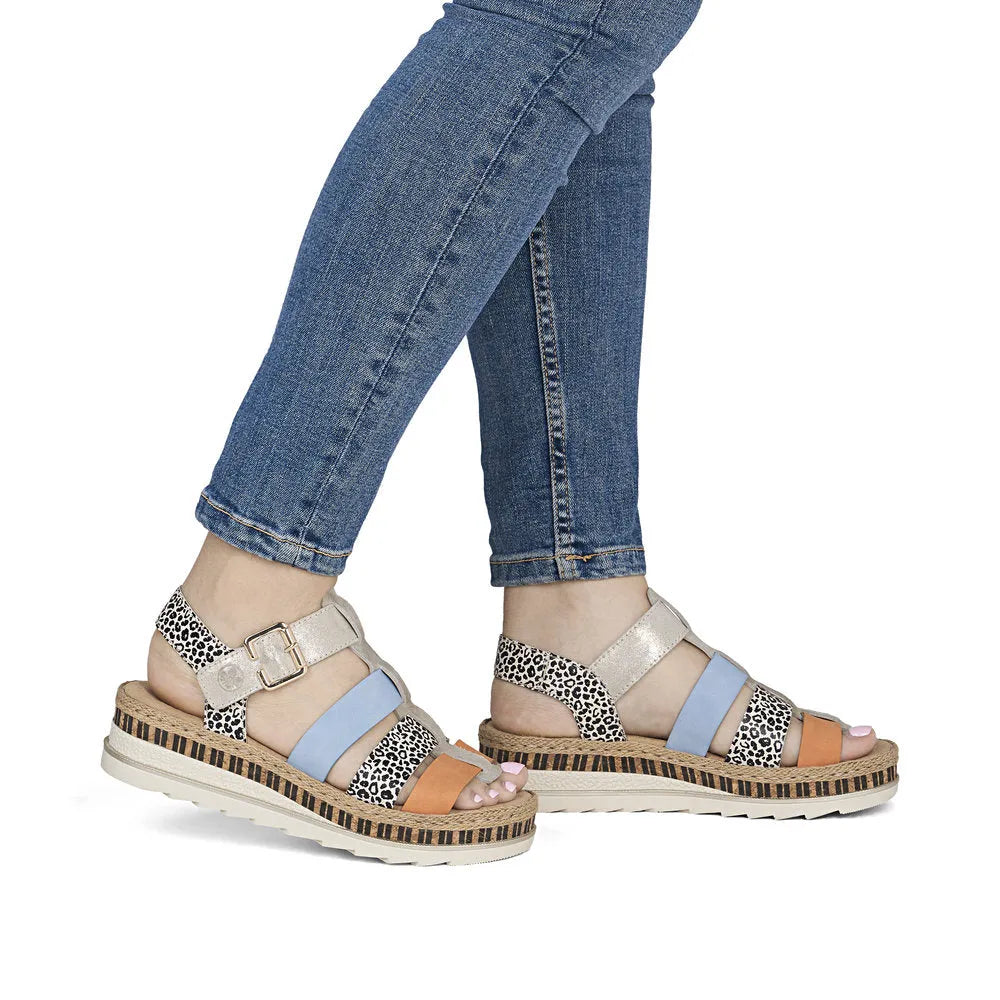 Rieker V7904-90 women's multi-color leather touch-fastening sandals with leopard print, chunky sole, and ankle straps.