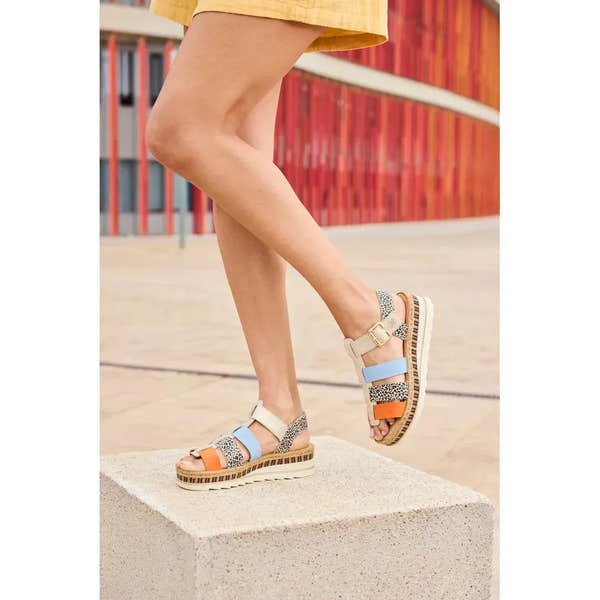 Rieker V7904-90 women's multi-color leather touch fastening sandals with striped sole and animal print accents.